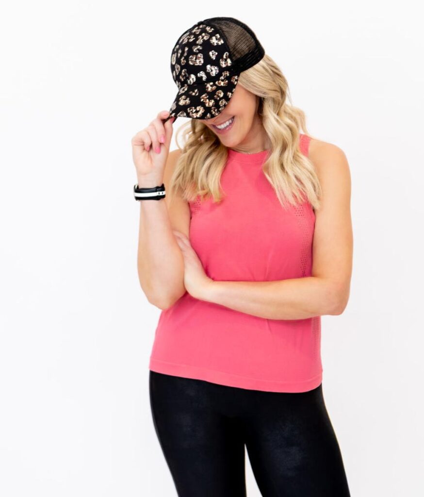 Erin, founder of Mindset Nutrition, posing in white room