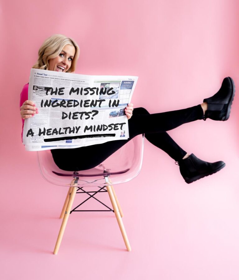 Erin from Mindset Nutrition reading a newspaper headline about maintaining a healthy mindset around food.